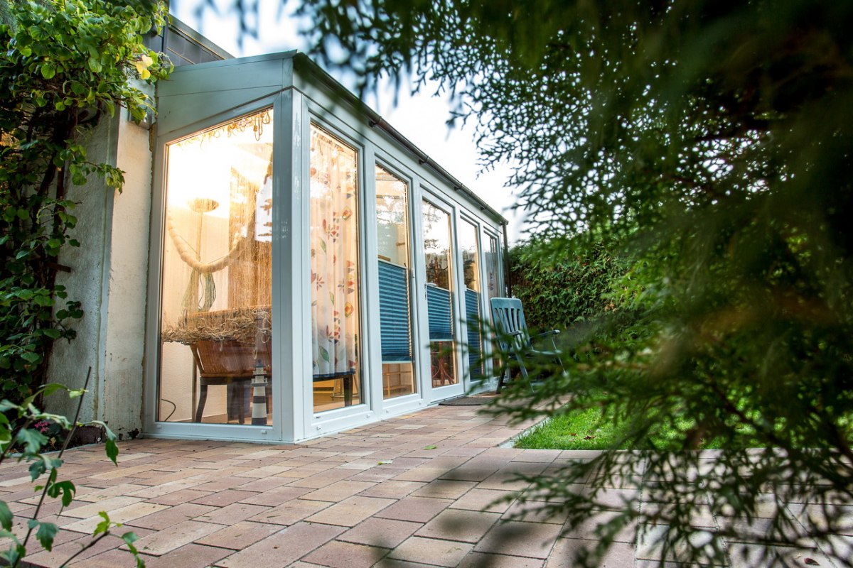 Entrance area with winter garden // © Fotografie Sebastian John Entrance area with winter garden // © Fotografie Sebastian John