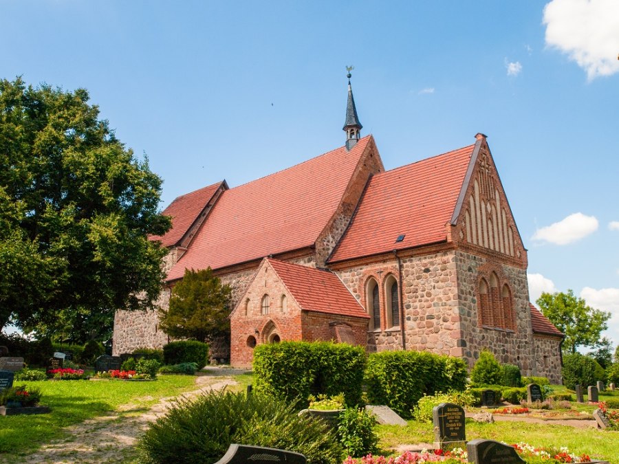 Church photographed sideways obliquely up the slope., © Frank Burger