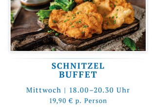 Crispy breaded schnitzel on a plate, with fried potatoes and fresh side salad, appetizingly served. // &copy; spreepiraten&reg;
