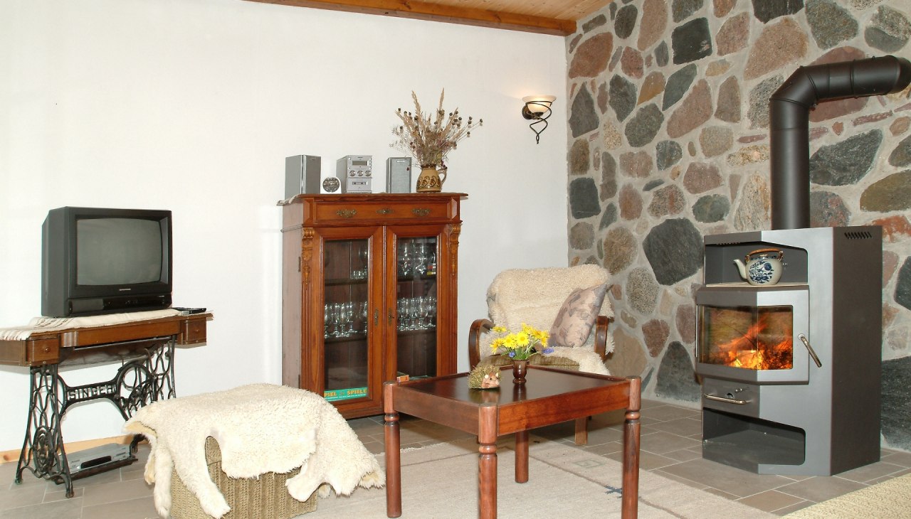 Enjoying and relaxing by the fireplace in the cottage "Schafstall" - especially in the cooler season, &copy; Bernd Friedrich