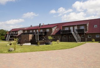 Uitzicht op de vakantiewoningen van vakantieboerderij Mirow // &copy; Ferienhof Mirow/Mewes