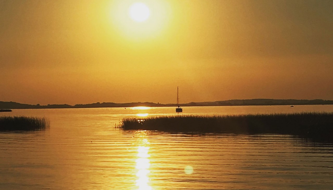 Zachód słońca nad wodą, © Lisa Friedrich Zachód słońca nad wodą, © Lisa Friedrich