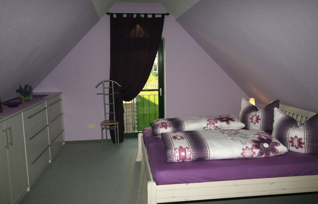 Comfortably furnished bedroom, © Andreas Hollstein