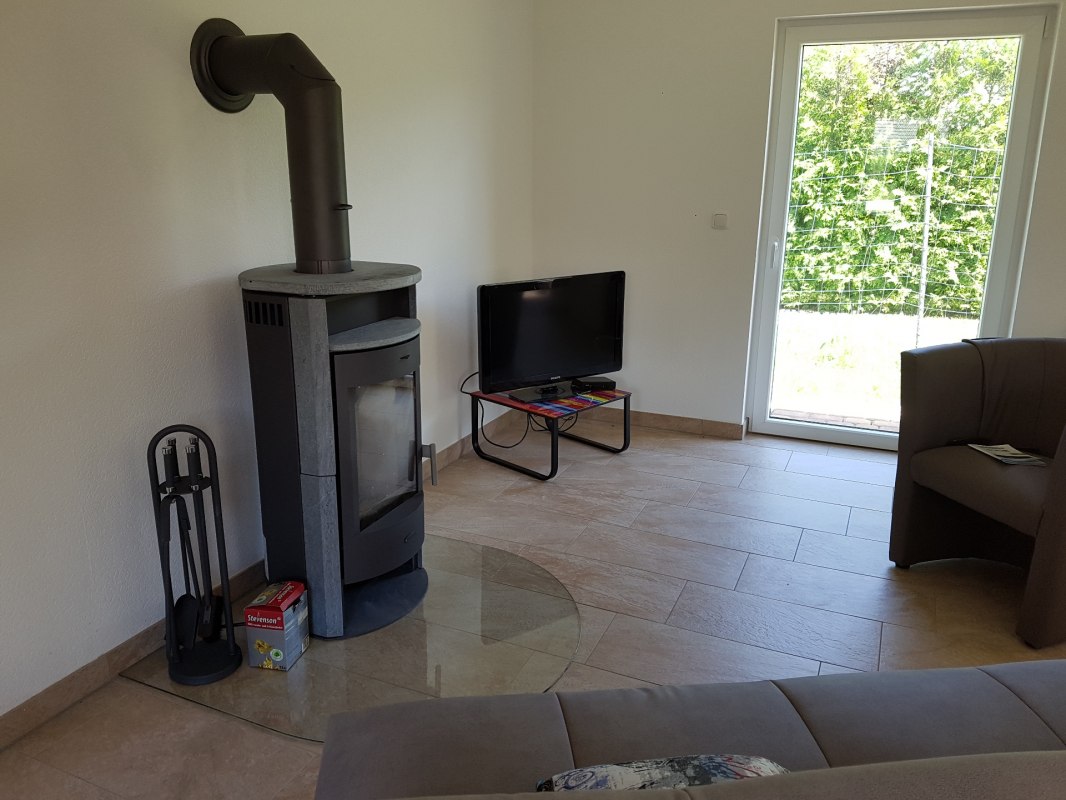 Er is een open haard in de woonkamer voor kille dagen, &copy; H. Pooyeh