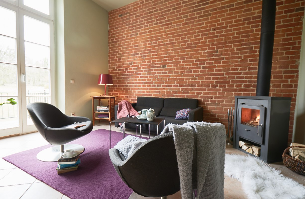 Atmosphere to feel good in the living room Margarete // &copy; Gut Pohnstorf