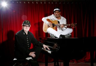 Andy on piano, Larry on guitar, &copy; Lawrence Harms