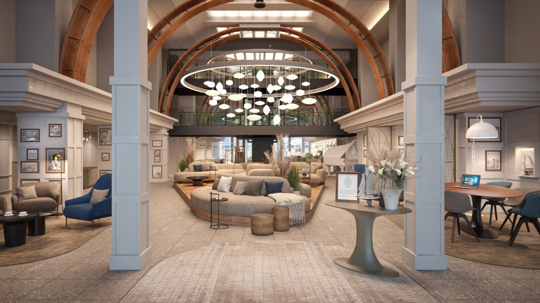 The central lounge area brings the surrounding nature into the lobby with sand-colored furniture, ocean-blue contrasts and spaciousness., © Mein Rügen Betriebsgesellschaft mbH