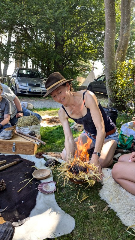 Making fire as in the previous story // &copy; Dr. Katrin Staude